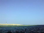 Back on the ship, we stored our equipment away. On the way to our lunch place, we have a last view to the ligthouse of Ras Mohamed.